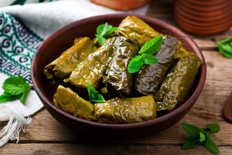 Dolma served in a wooden bowl