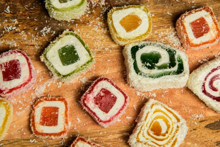 Turkish delight pieces on a wooden board