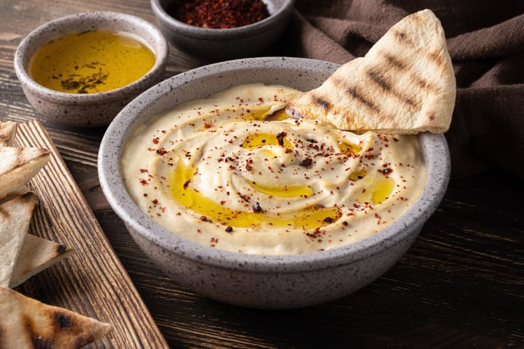 A bowl of hummus, which is a delicious Middle Eastern food loved worldwide