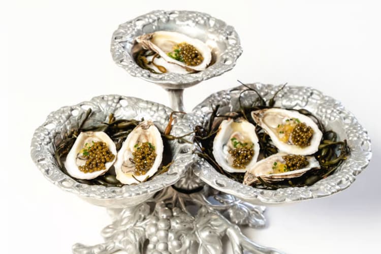 Caviar on oysters shelf
