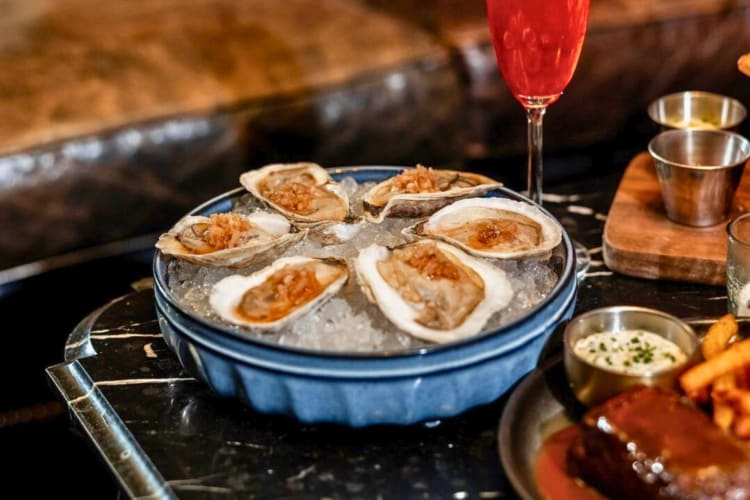 Half dozen oysters on the half shelf