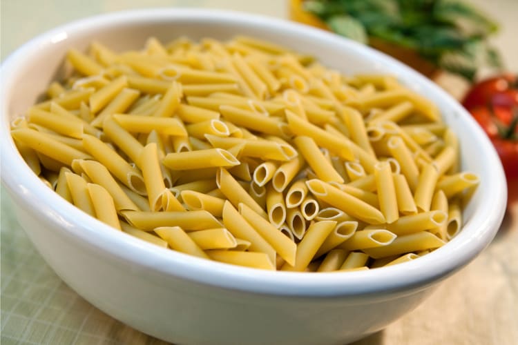 The main difference when comparing mostaccioli vs. penne is the appearance