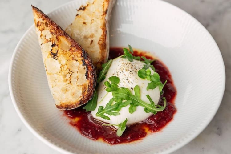 Burrata with strawberry compote, basil and toasted ciabatta