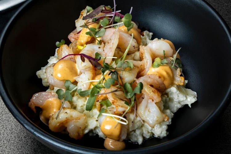 Gambas al ajillo salad is a signature dish in a new restaurant in Miami