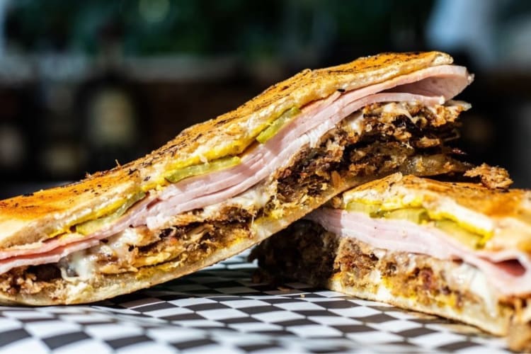 Louie’s at Palm House is a new restaurant in Miami serving the best Cuban sandwich