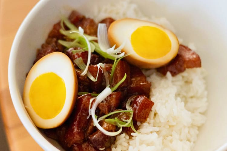 Sweet pork bowl served with steamed rice and eggs