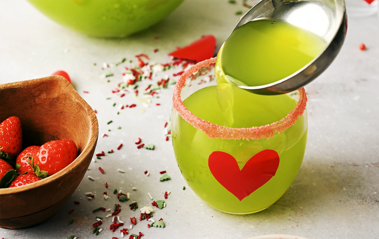 green Christmas punch with Santa hat decoration