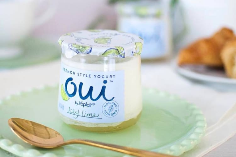 The Key lime Oui yogurt flavor in front of a teaspoon