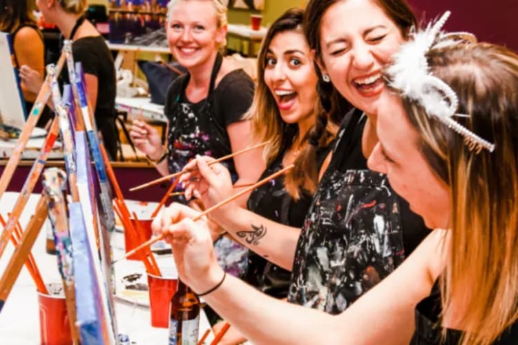 visiting a paint bar makes for fun team building activities in boston