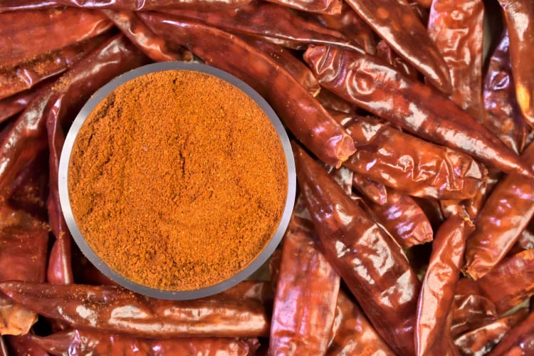 Queso añejo is a tasty Mexican cheese with paprika coating