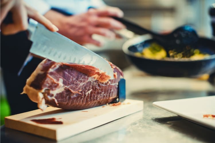 Slicing parma ham