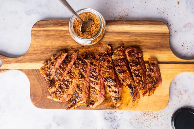 Aerial view of brisket slices and a dry rub — a great Passover food option