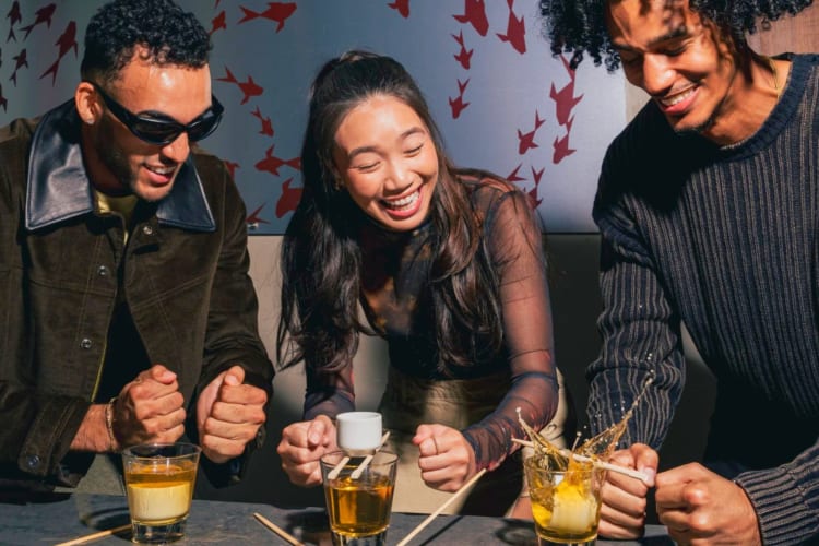 people celebrating a birthday with drinks at Benihana
