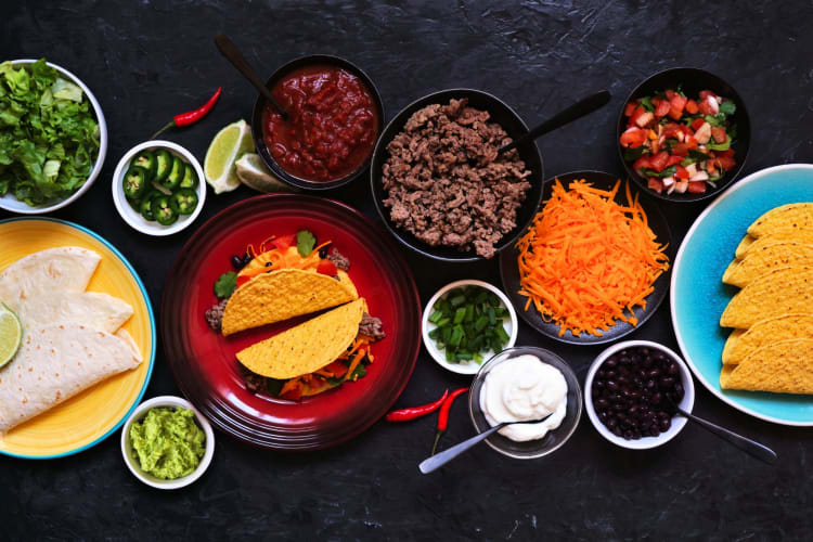 DIY taco bar with meat, cheese and salsas