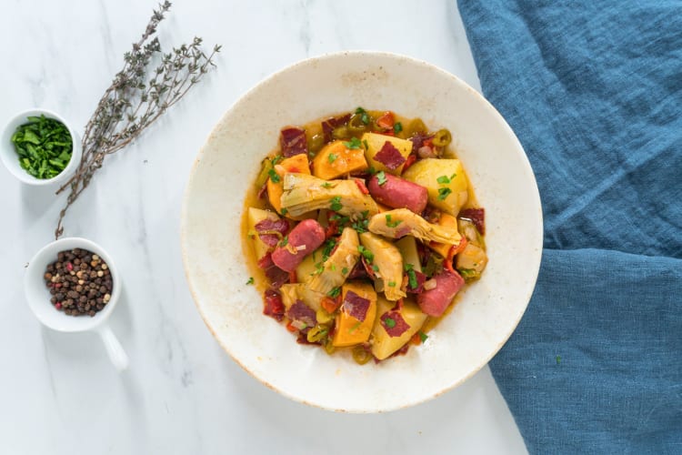 A potato stew is a comforting potluck idea