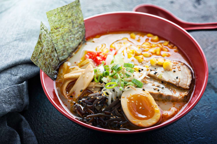 Ramen miso soup bowl with corn, nori and a hard boiled egg