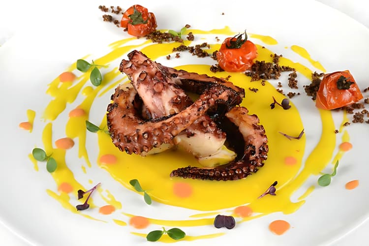 Octopus with cream of potatoes and saffron