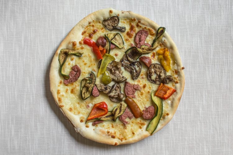 The Sunset pizza is a must-try at this restaurant in Genoa