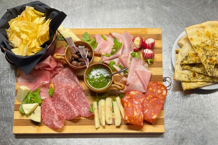 Enjoy a first-rate cheeses and cured meats platter at this restaurant in Genoa