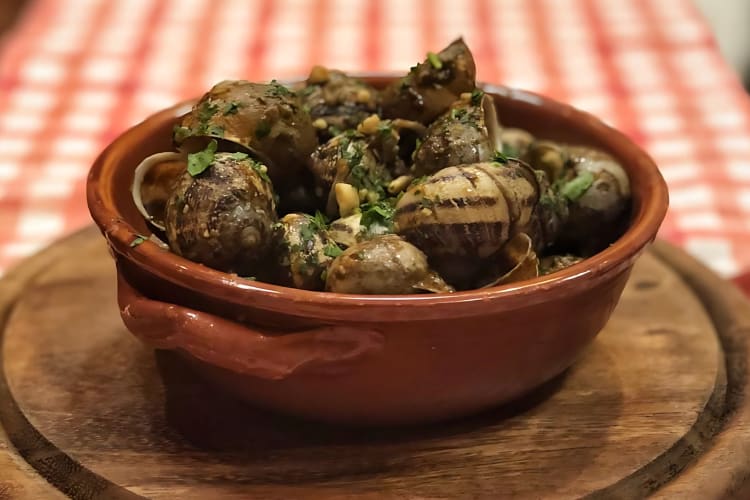 Try the Varezzine snails at this restaurant in Genoa