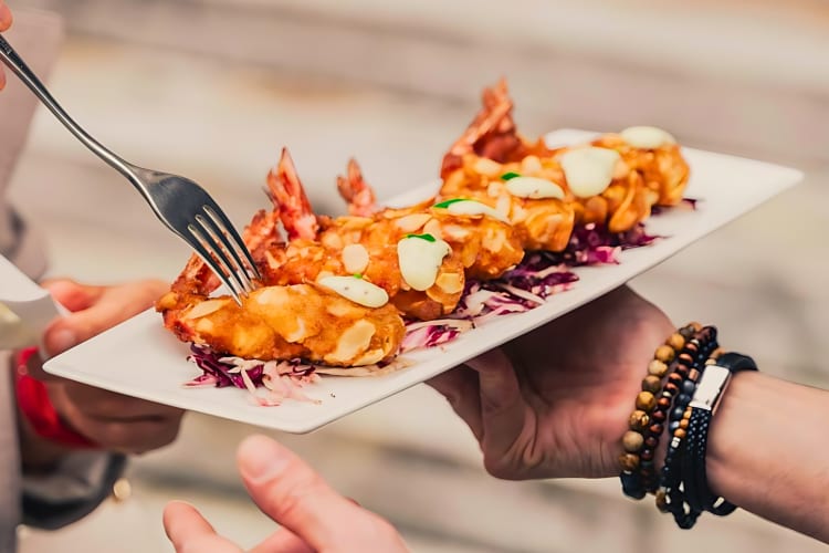 Enjoy the fried almond prawns at this restaurant in Genoa