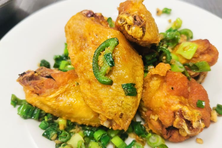 Chicken pieces topped with scallions, from Golden Tree Restaurant in Chinatown, Los Angeles