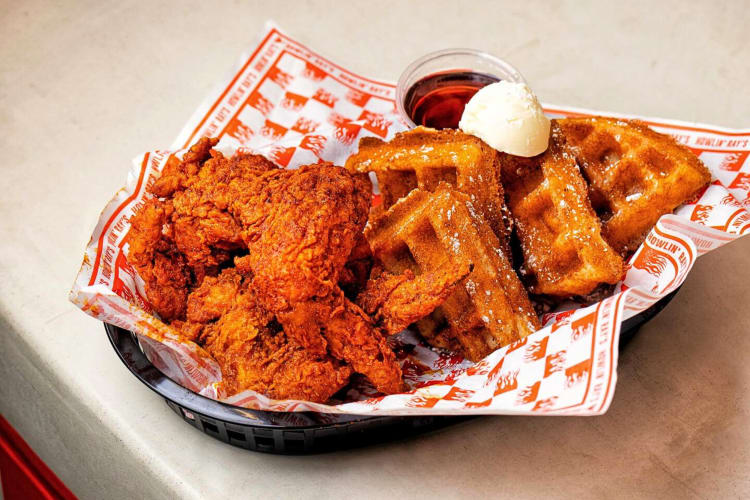 Chicken, waffles, ice cream and syrup, from Howlin’ Ray's, a restaurant in Chinatown, Los Angeles