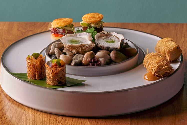 A plate of different tasting foods from Mari in NYC