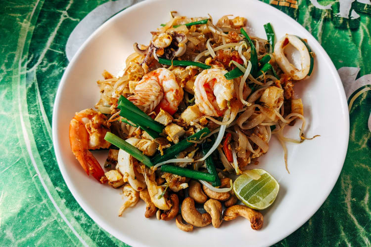 Pad thai on a white ceramic plate