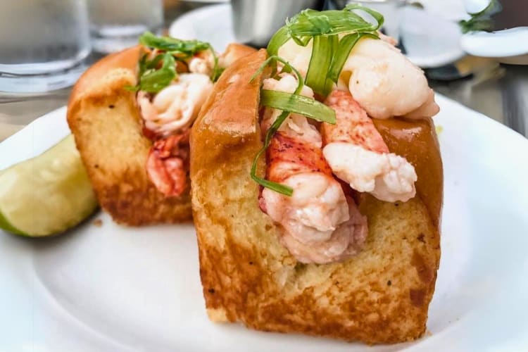 Lobster rolls served with a pickle