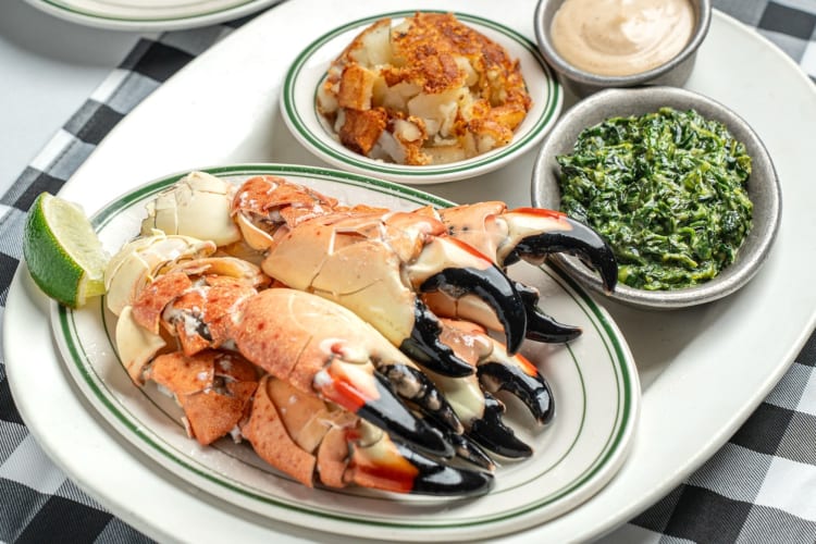 Stone crabs, hashed brown potatoes, cole slaw and creamed spinach