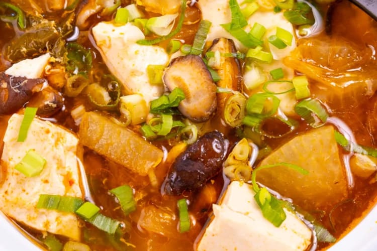 A bowl of tofu soup.