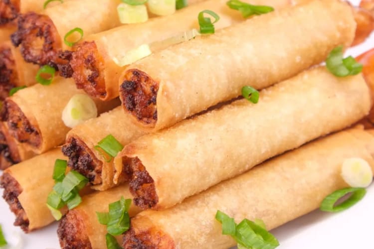 A plate of shrimp rolls.