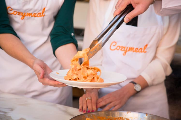 Dishing up pasta in a cooking class in Philadelphia.