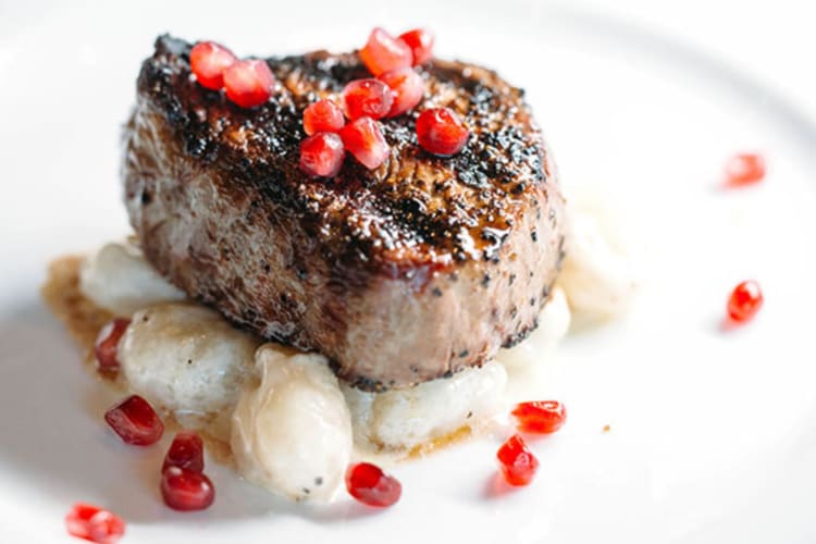 Prime beef tenderloin served on a plate