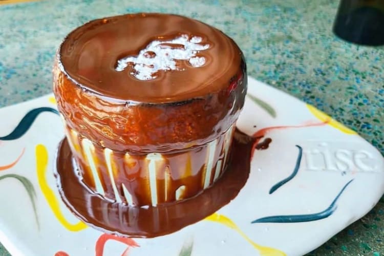 Chocolate soufflés served on a colorful plate