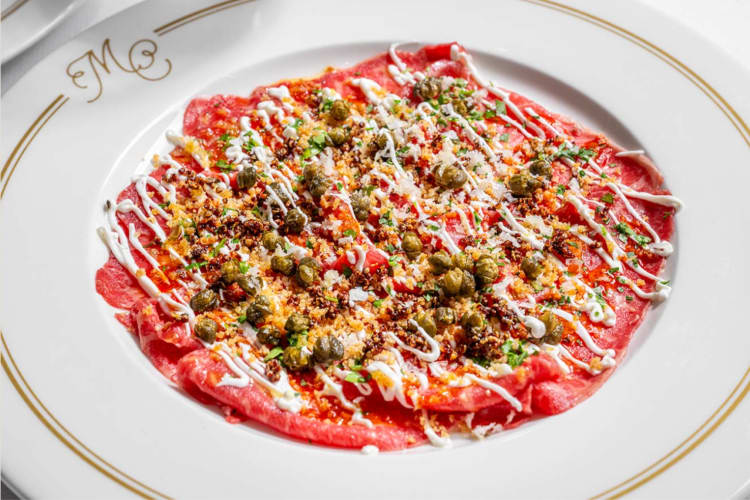 Choice a prime beef carpaccio as an appetizer at this romantic restaurant in Dallas