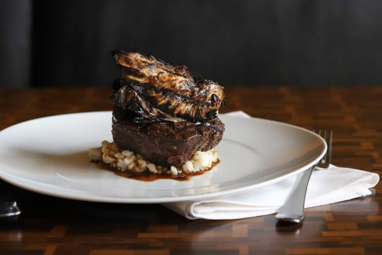 Filet mignon served with creamy risotto