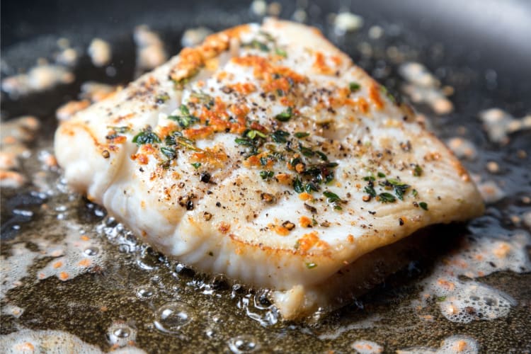 Cooking sablefish in a pan