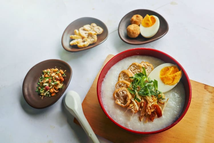 Rice porridge topped with shredded chicken for breakfast in Seattle.