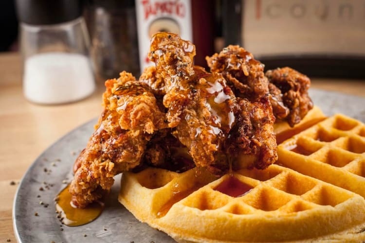 A delicious Seattle breakfast is chicken and waffles.