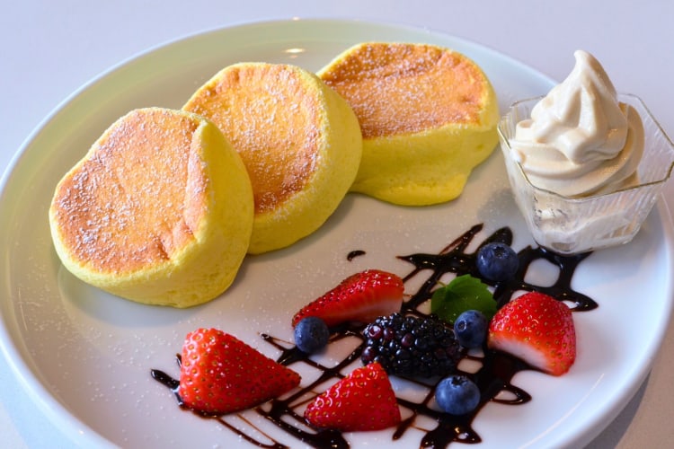 Looking for a satisfying breakfast in Seattle? The Japanese pancakes are fluffy soufflé-style pancakes topped with whipped cream and fresh fruit.