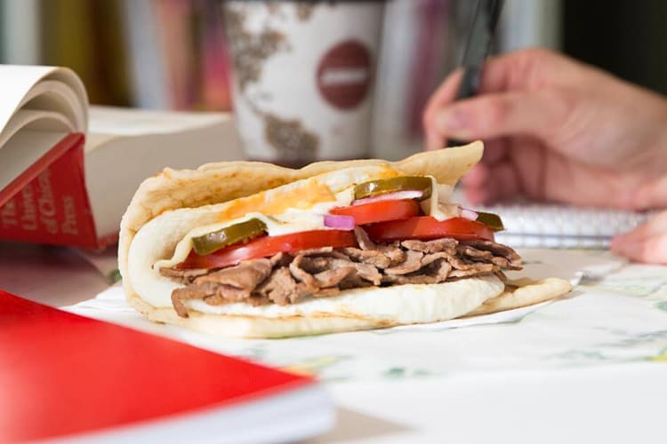A Subway breakfast flatbread sandwich with egg and steak