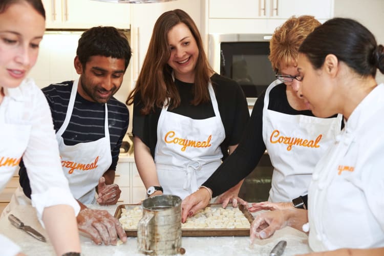 People practicing culinary team building activities in Houston