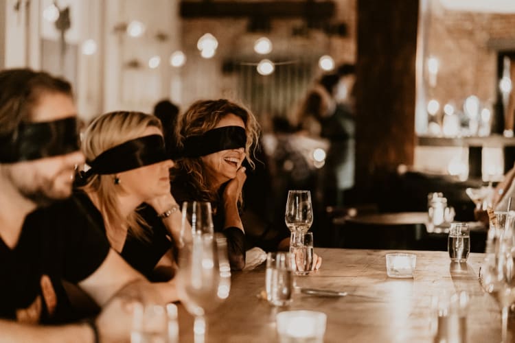 People dining with blindfolds