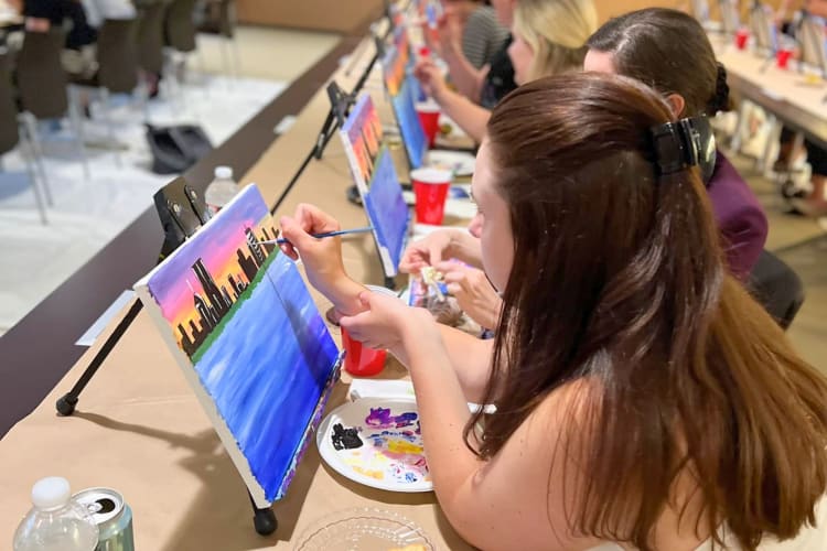 visiting a paint bar makes for fun team building activities in Boston
