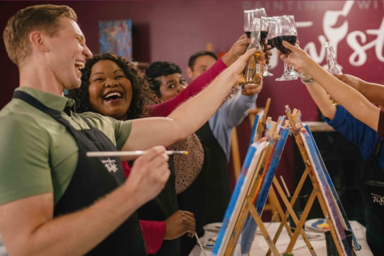 A painting and sipping event is a great team building activity in Denver