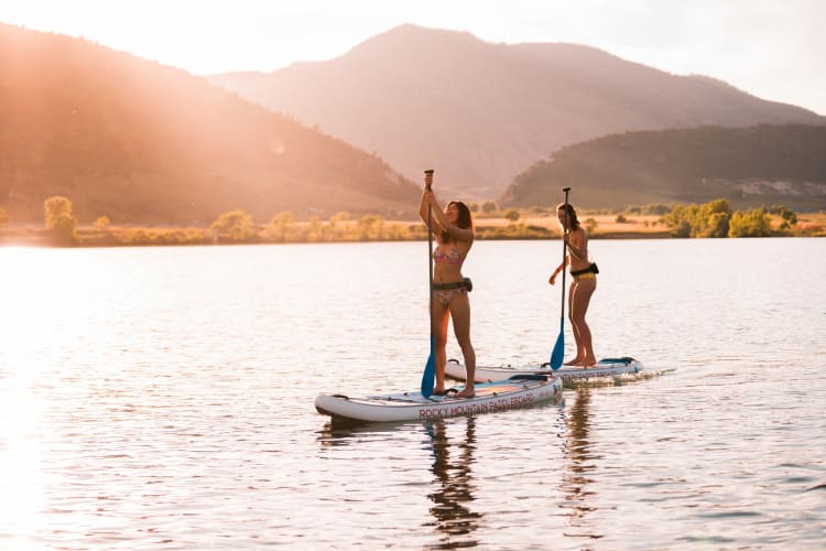 Paddleboarding is an excellent team building activity in Denver