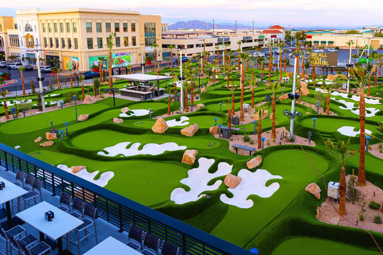 A long shot from above of the mini golf courses at PopStroke