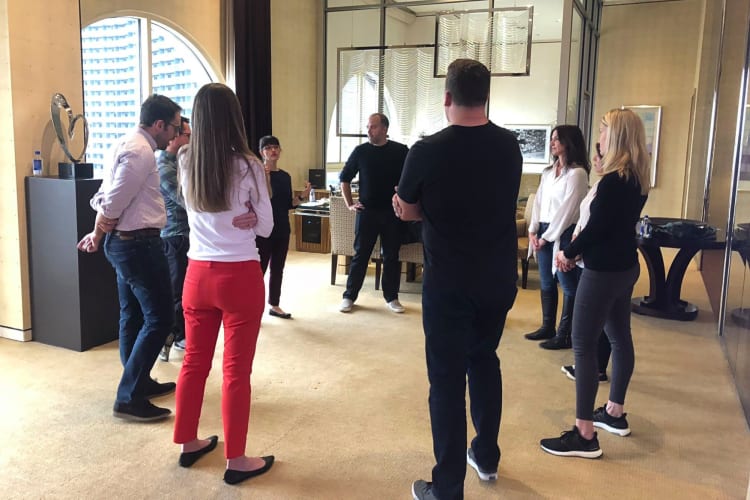 Nine people taking an improv class, a great idea for a team building activity in Las Vegas